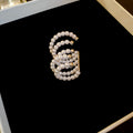 Layered Pearl Ear Cuff with Five Curved Rows With Polished Metal Details view 6