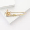 Long Gold Tone Safety Pin Brooch With Red Teardrop Flower view 3