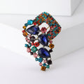 Geometric Crystal Cascade Brooch with Polished Metal and Decorative Accents view 6