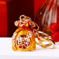 Jeweled Fortune Pouch Keychain with Red Enamel and Gold Tone Trim view 2