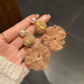 Pearl Stud Yarn Ball and Knitted Flower Drop Earrings view 4