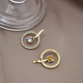 Gold Crystal Circle Stud Earrings Center Stone Flame view 4