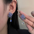 Blue Flower Clear Teardrop and Green Leaf Stud Earrings view 1