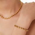 Gold Hollow Heart Linked Chain Necklace and Bracelet Set view 3