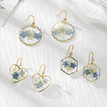Gold Tone Blue Pressed Flower Drop Earrings in Three Geometric Shapes view 1
