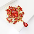 Oversized Crystal Teardrop Brooch With Polished Metal And Sculpted Decorative Details view 3