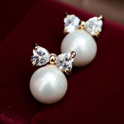 Product view 1 showing clear-stone bows over white pearl-look drops