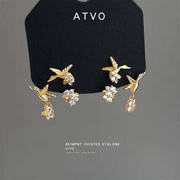 Gold Tone Bird Leaf Branch And Clear Flower Stud Earrings