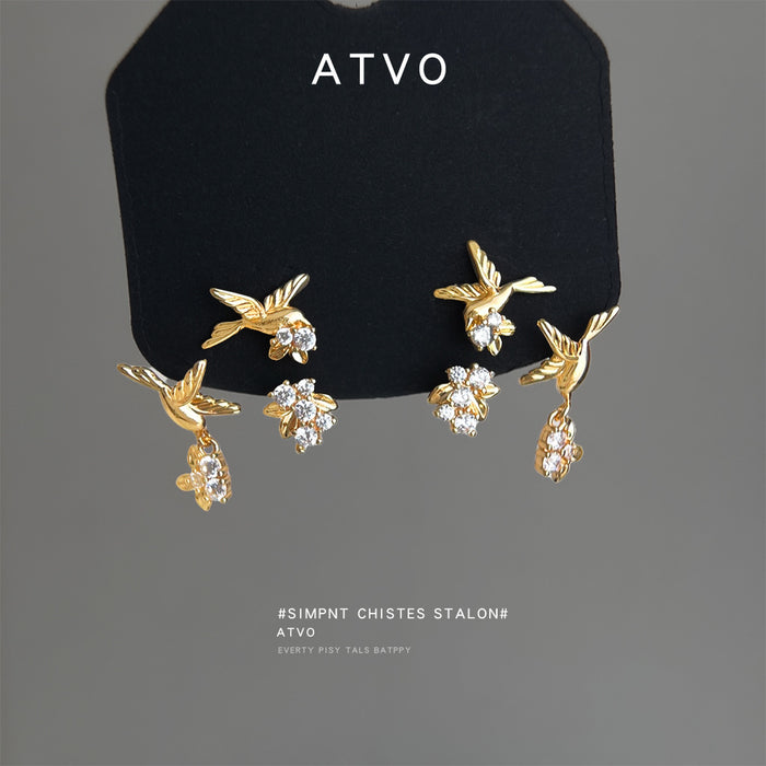 Gold Tone Bird Leaf Branch And Clear Flower Stud Earrings