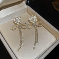 Floral Bow and Butterfly Drop Stud Earrings in Two Designs view 6
