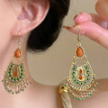Green Enamel Teardrop Fringe Hook Earrings with Polished Metal Details view 1