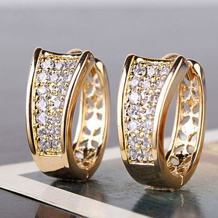 Gold Tone Triple Row Crystal Hoop Earrings with Polished Metal Finish