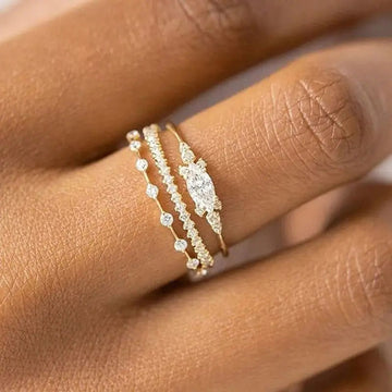 Three-Piece Marquise And Round Stone Ring Set In Three Metal Tones