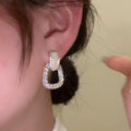 Silver Tone Crystal Geometric Drop Earrings with Open Centers view 3