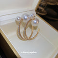 Gold Tone Double Hoop Earrings With Pearl Studs With Polished Metal Tone Details view 2