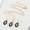 Gold Tone Black Enamel Hamsa Eye Necklace and Hook Earrings view 5