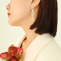Vertical Triple B Letter Zircon Drop Earrings Gold Steel view 1
