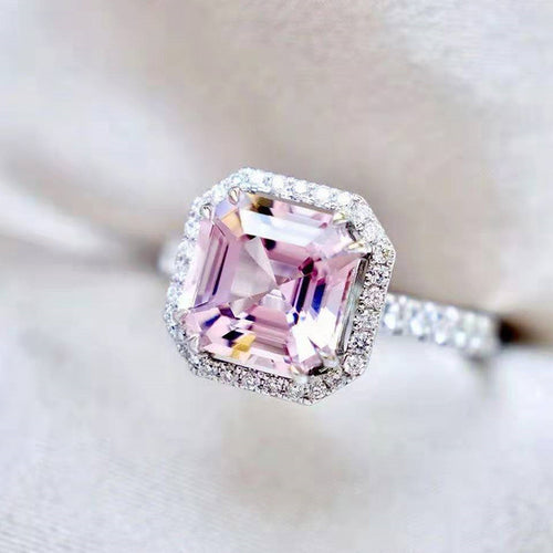 Product view showing silver-tone pink square solitaire halo ring