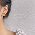 Gold Tone Irregular Round Frame And White Pearl Cluster Stud Earrings view 4