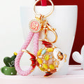 Mixed Jeweled Pufferfish and Crown Dolphin Keychains in Many Styles view 9