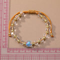 Faceted Clear Bead and Gold Tone Evil Eye Cord Bracelets view 5