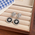 Clear Stone Top Black Round Silver Tone Medallion Earrings view 3