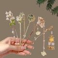 Gold Tone Fan Hair Stick With Pearl Like Chains And Leaf Drops view 1