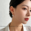 Gold X Cross Pearl Teardrop Stud Earrings Crystal Pair view 2