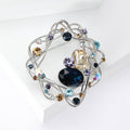 Wire Nest Brooch With Faceted Center Stone and Scattered Crystals view 2