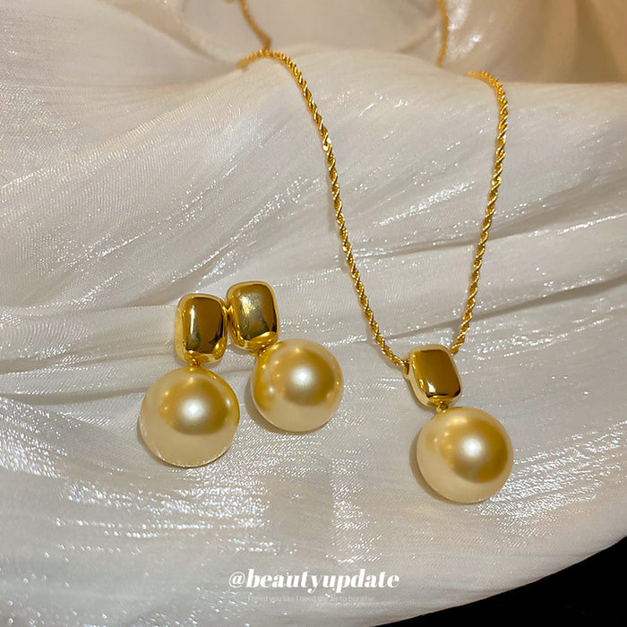 Gold Tone Champagne Pearl Like Pendant Necklace And Drop Earring Set