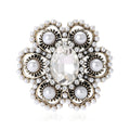 Pearl and Crystal Floral Brooch with Polished Metal and Decorative Accents view 1