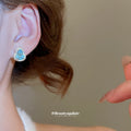 Blue Crystal Heart Stud Earrings In Two Metal Tones view 3