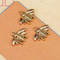 Small Striped Bee Metal Charm in Four Vintage Finishes view 7