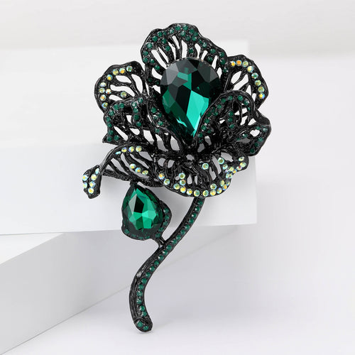 Large Crystal Rose Brooch displayed in a styled setting