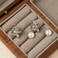 Silver Flower Pearl Look Long Curved Hook Drop Earrings view 3