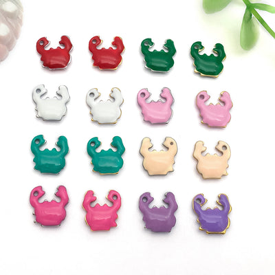 Colorful crab charms arranged on a light background