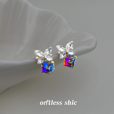 Silver-tone clear-leaf multicolor-crystal studs in the first product display.