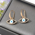 Gold Tone Crystal Heart Star and Evil Eye Hook Earrings view 5