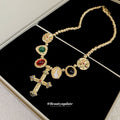 Gold Tone Multicolor Stone Cross Pendant Necklace With Polished Metal Details view 4