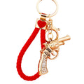 Gold Tone Revolver Keychain with Clear Crystal Grip Panels view 5