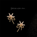 Gold CZ Starburst Firework Twisted Rope Bow Stud Earrings view 1