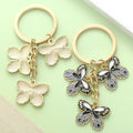 Butterfly Charm Keychains Featuring Black Trio Across 31 Pictured Variations view 4