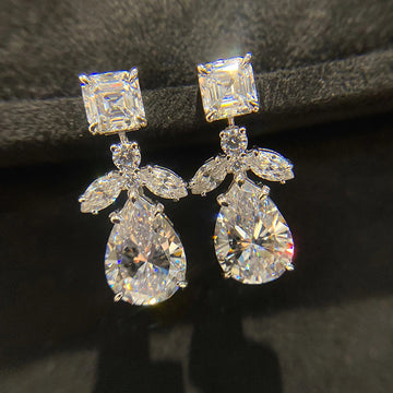 Silver Tone Pear Crystal Drop Earrings With Leaf Clusters