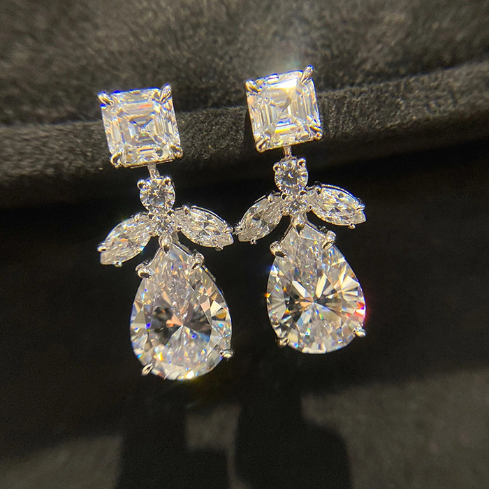 Silver Tone Pear Crystal Drop Earrings With Leaf Clusters