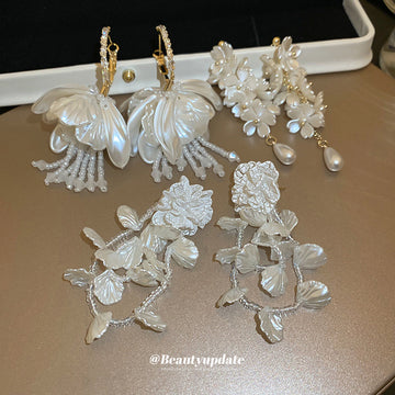 White Floral and Shell Drop Earrings with Beaded Tassels