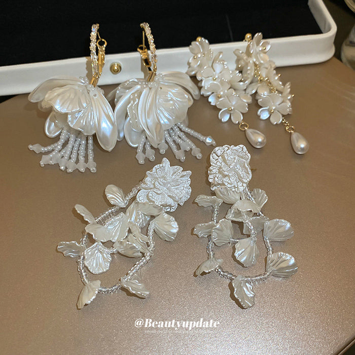 White Floral and Shell Drop Earrings with Beaded Tassels