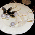 Sheer White Butterfly Hook Earrings with Round Pearl Drops view 2