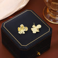 Gold Tone Folded Five Petal Sculptural Flower Stud Earrings view 4