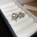 Silver Tone Cross Charm Huggie Hoops In Two Styles view 6