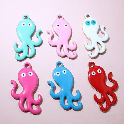 gold tone enamel octopus charms assortment showing the available designs and finishes